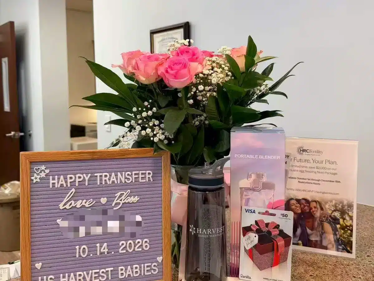 Surrogate screening day with a welcome sign and fresh flowers